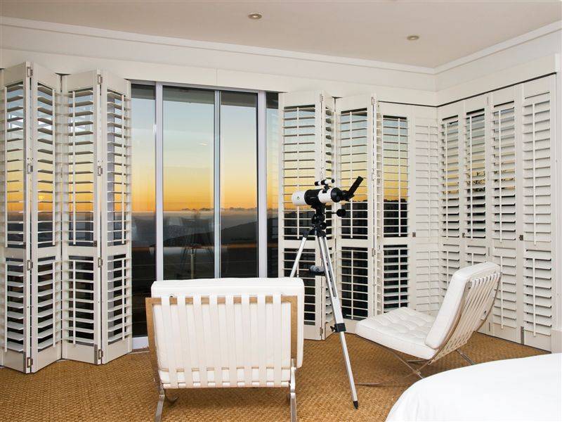 white sliding shutters the shutter company