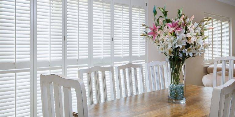 bi-fold window door shutters in living room
