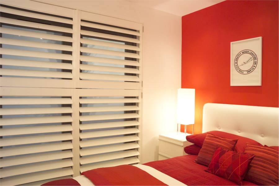 large white shutter blinds bedroom