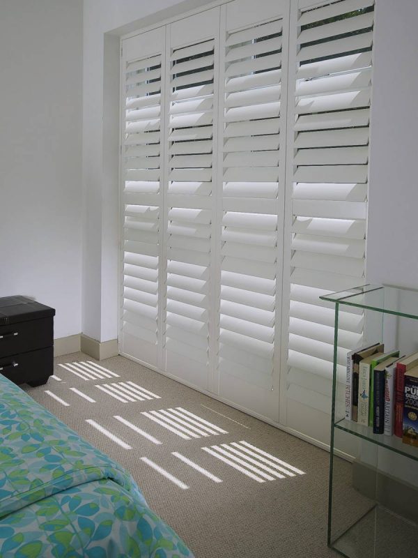 large custom coloured bay windows shutters