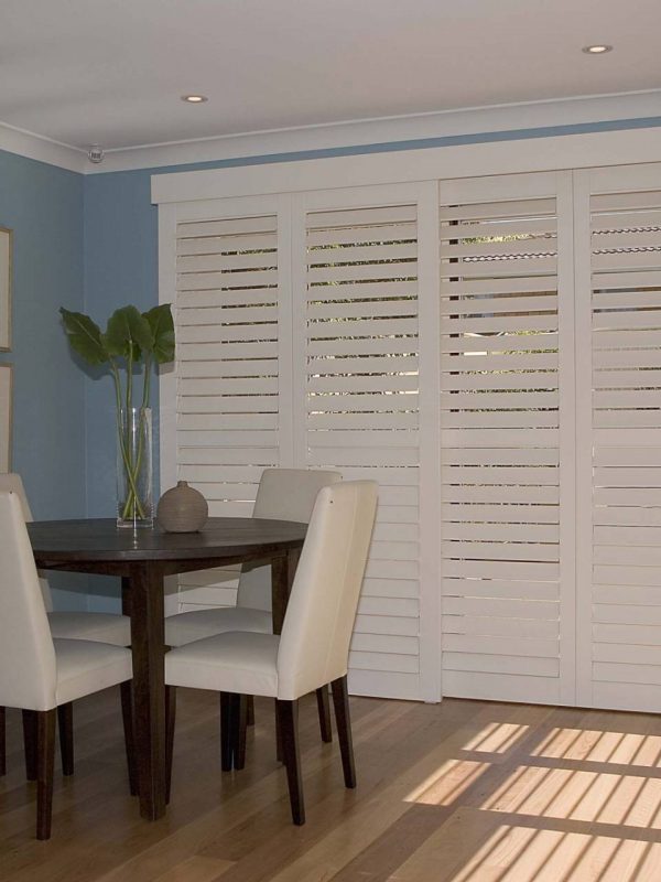 closed inside shutter blinds living room